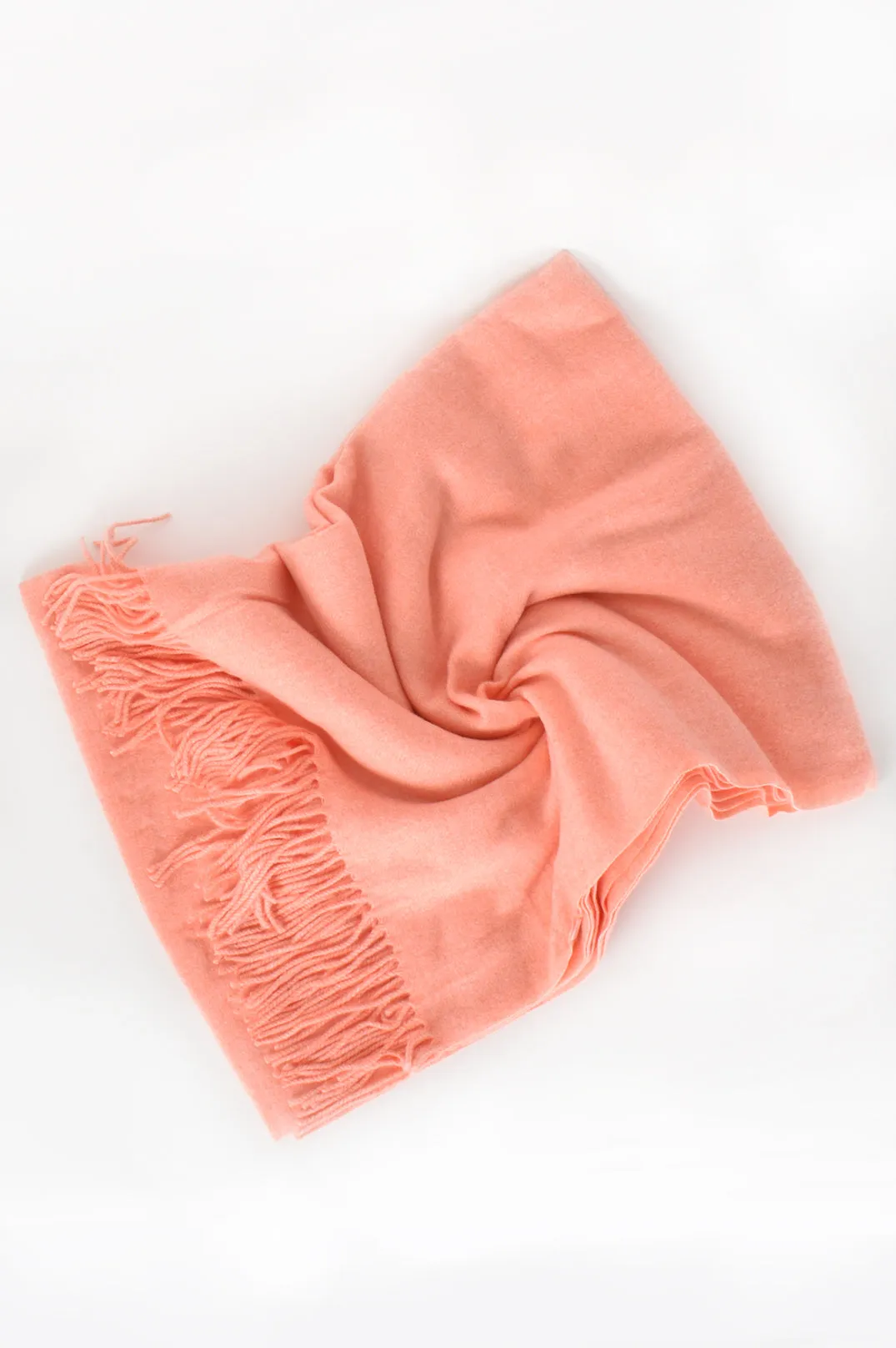 Get Cozy Fringe Scarf available in Mango and Peach Colours